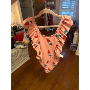 lola + The Boys Pinkie Bomb Pop swimsuit features playful statement ruffle 8